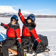 From Tromsø: Snowmobile Adventure to Finnish Lapland