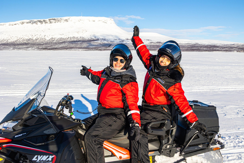 From Tromsø: Snowmobile Adventure to Finnish Lapland