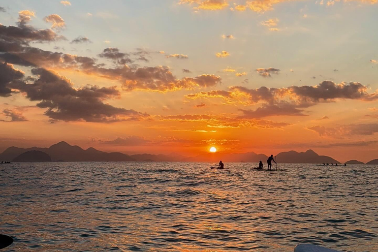 See the Sunrise in Copacabana from a Stand Up Paddleboard with Photos