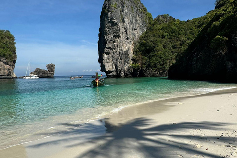 Phi Phi: 7 Islands longtail boat with Sunset and Plankton