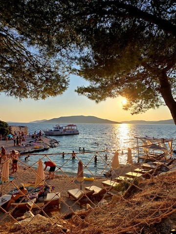 Trogir: Sunset Boat Tour with Swimming Stop at Kava Beach
