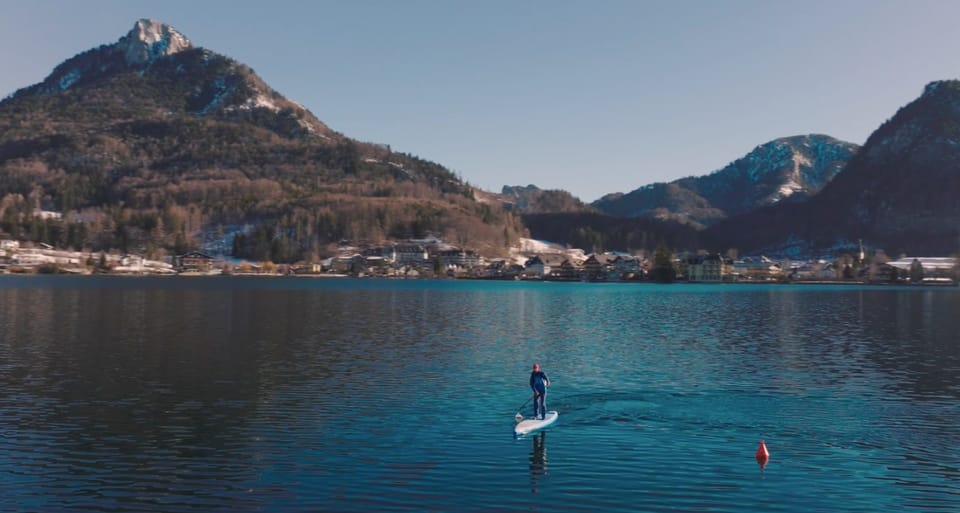 Fuschlsee StandUp Paddleboard guiado en invierno y té GetYourGuide