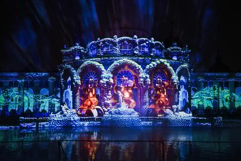 People enjoying a party atmosphere with lights and music in Budapest