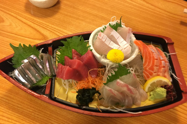 大阪：深度美食之旅和难波酒吧之旅不包括费用的团队游