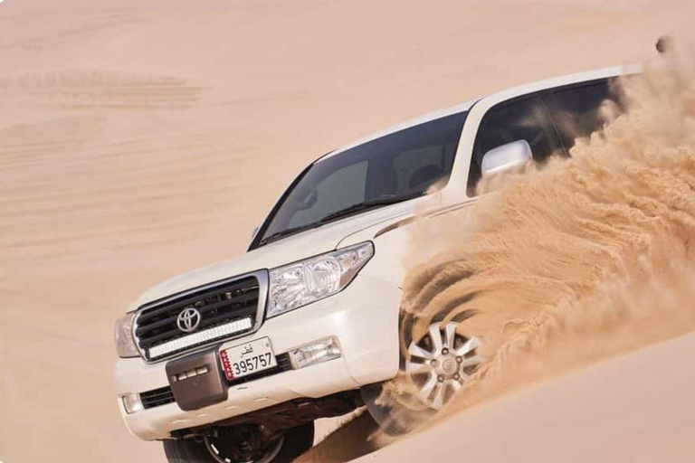 Safari por el desierto de Doha: Conducción en dunas, paseo en camello y Sandboarding