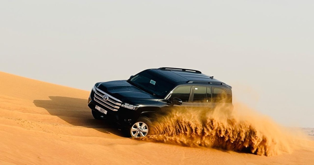 Dubai: Arabian Desert Safari with BBQ and Quad Bike Tour | GetYourGuide