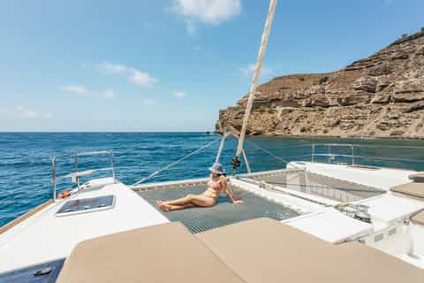 Santorini: Luxury Small Group Catamaran w/ Meal & Open Bar