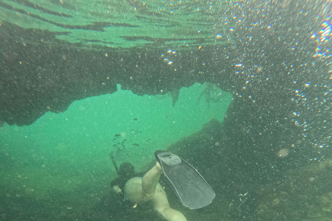 Explore the Cabo Rosa Tunnels on Isabela: snorkeling, wildlife and scenery