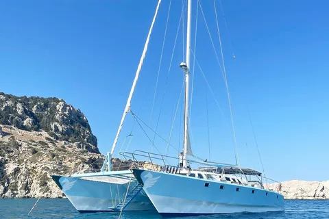 From Rhodes: Half-Day Catamaran Cruise with Swim Stops