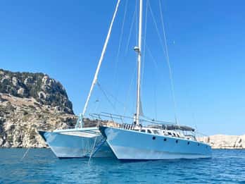 From Rhodes: Half-Day Catamaran Cruise with Swim Stops