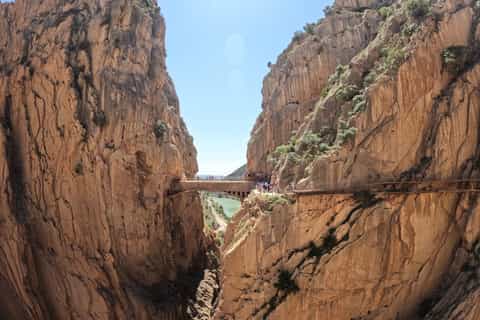 Official guide leading a small group on Caminito del Rey
