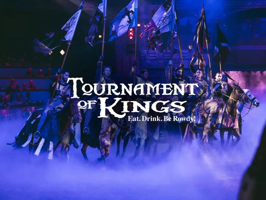 A knight on horseback riding across the sand of a brightly lit medieval arena