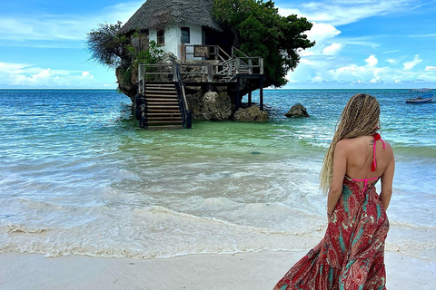 Zanzibar: laguna blu, ristorante sulla roccia, grotta e spiaggia