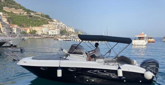 Taormina Private Boat Tour: Isola Bella, Grotta Azzurra, and Aperitif.