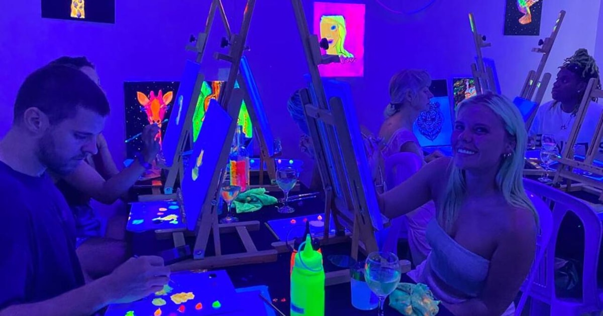 Barcelona Fluorescent Paint and Wine GetYourGuide