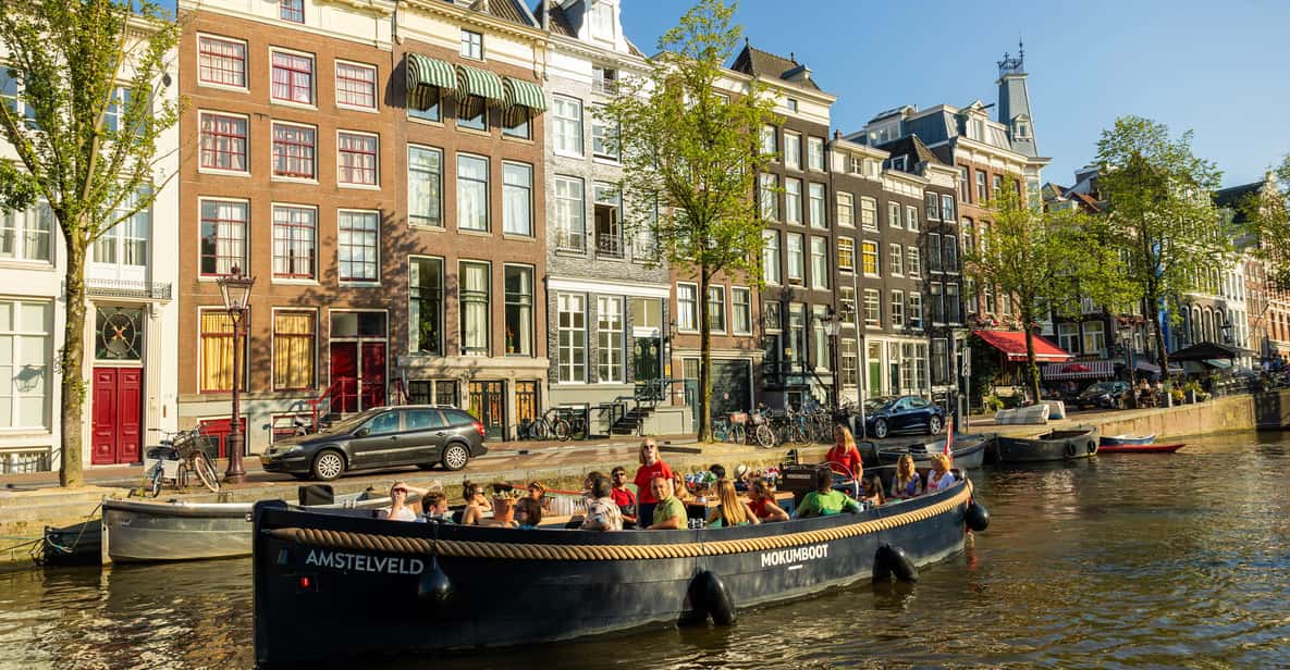 Afbeelding 14 van Amsterdam: begeleide open boottocht met onbeperkt drankjes