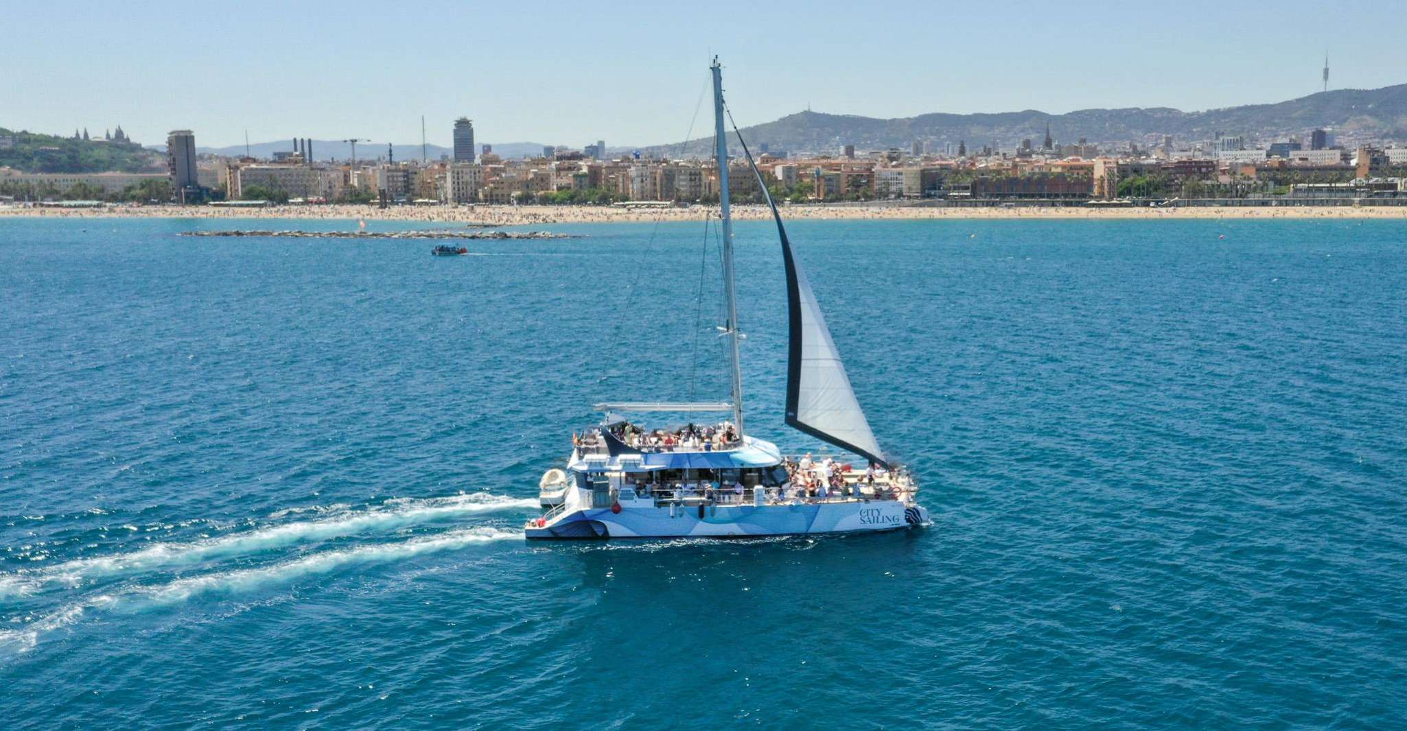Barcelona: Daytime or Sunset Catamaran Cruise with Music photo 8