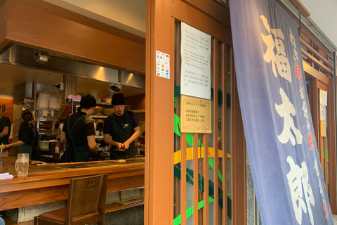 大阪：深度美食之旅和难波酒吧之旅不包括费用的团队游