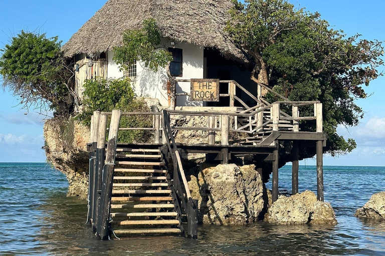 Zanzibar: laguna blu, ristorante sulla roccia, grotta e spiaggia