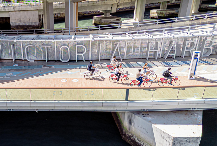 Victoria Harbour Shoreline Bike + Street Food Half-day Tour
