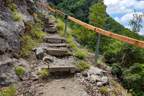 "Pëllumbas Cave and Erzeni River: Hiking and Swimming"