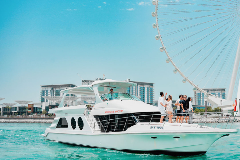 Dubai, Dubai Marina Sightseeing-kryssning med utsikt över Ain WheelSightseeingkryssning i småbåtshamn ombord på en yacht