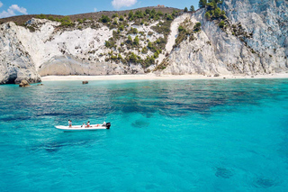 Cruise to White Rocks Beach & Xi Beach with lunch & wine