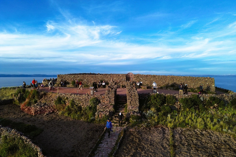 From Puno: Lake Titicaca 2-Day Tour with Homestay From Puno: 2-Day Guided Tour with Fixed Pickup Point