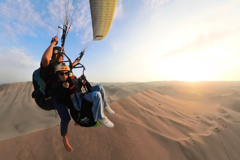 Paraglide over the desert and the Huacachina oasis