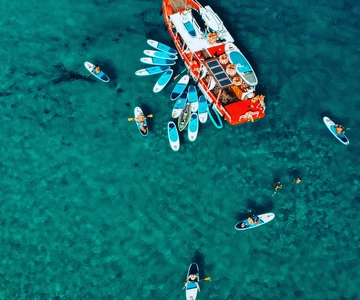 Ibiza: Secret Coves Guided Boat Tour with Open Bar and Tapas