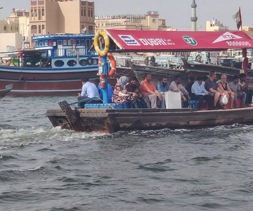 walking tour in old dubai, souks, abra boat, old town