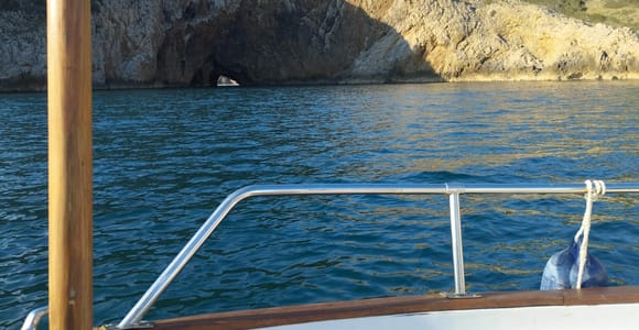 Sunset in the Bay of Roses on board a traditional boat
