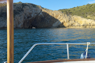 Sunset in the Bay of Roses on board a traditional boat