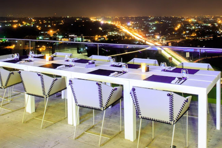 Accra: Instagrammable Nightlife Tour with a welcome drink Accra Tour: 1 Welcome Drink, 360° Skybar Views, & Shopping