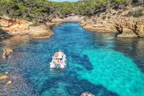 Palma Mallorca: Private Bootsfahrt mit Wasserspielzeug