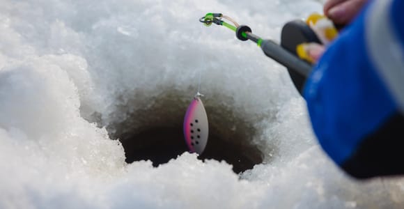 Levi: Guided Ice Fishing Experience with Minivan