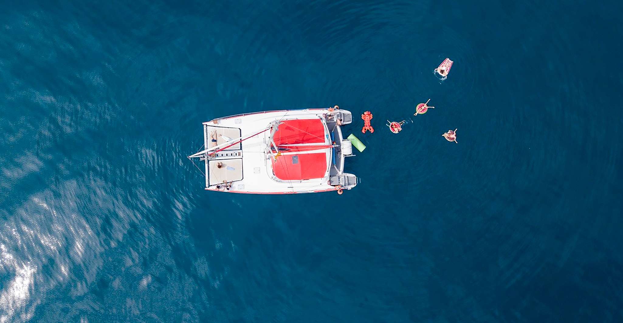 Barcelona: Sunset or Day Catamaran Cruise with Tapa & Drink photo 1