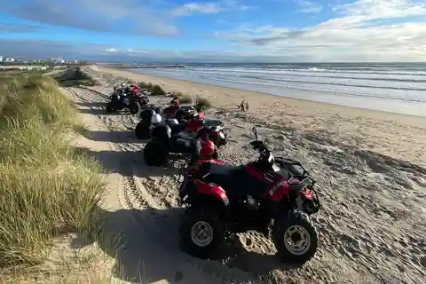 From Lisbon: Costa da Caparica Guided Quad Bike Tour