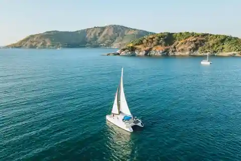 Phuket: Coral Island Day Trip and Sunset Dinner by Catamaran