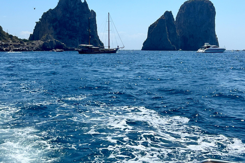 From Naples: Boat trip to Capri with city visit and stops for swimming From Naples: Capri Boat Tour with City Visit and Stops for Swimming
