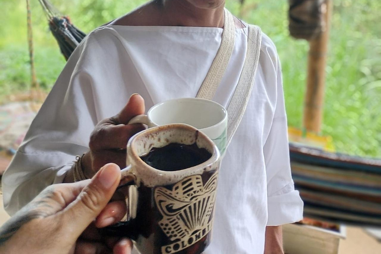 Minca: Ancestral encounter with the Wiwa community, viewpoint, and hidden waterfall Minca: Ancestral Wiwa Community, Viewpoint, and Hidden Waterfall