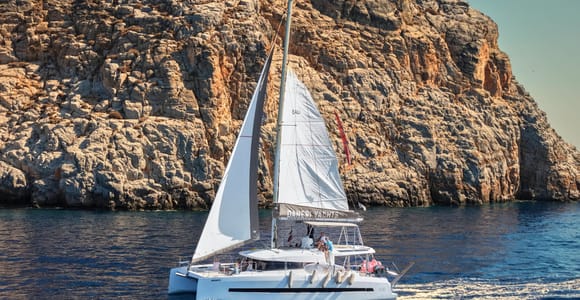 Hersonissos: Dia Catamaran Cruise with Lunch & Drinks
