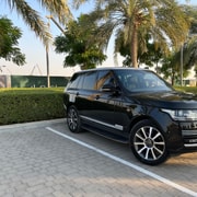 Dubai: Full-Day Range Rover and Chauffeur Hire | GetYourGuide
