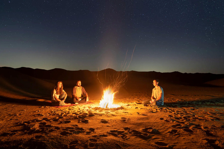 Dubai: Safari serale nel deserto con giro in cammello e osservazione delle stelleTour condiviso con vista sul tramonto