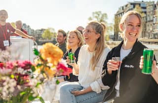 Amsterdam: Grachtenfahrt mit französischsprachigem Guide & Getränkeoption
