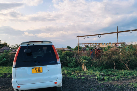 Arusha: Waterfall, Mountain Swing, Canoeing & Village Tour