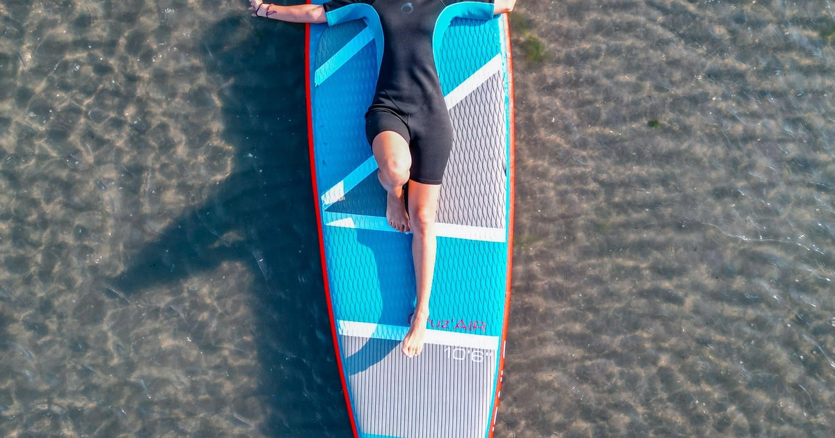 Yoga on the Stand Up Paddle Board at Salzburg Lakes | GetYourGuide