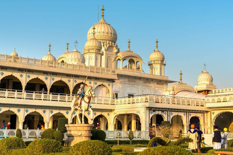 From Agra: Akbar Tomb and Gurudwara Guru Ka Taal Guided Tour Tour with Private Car, Driver and Local Expert Tour Guide
