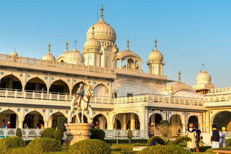 From Agra: Akbar Tomb and Gurudwara Guru Ka Taal Guided Tour Tour with Private Car, Driver and Local Expert Tour Guide