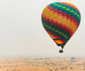 Dubai: Sunrise Balloon Flight with Camel Ride & Breakfast